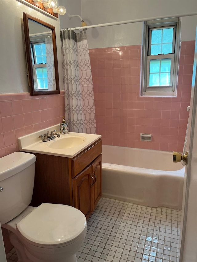 210-12 69th Ave Lower, Lower, Oakland Gardens, NY 11364 - full bathroom featuring tile patterned flooring, tile walls, vanity, toilet, and shower / bath combo with shower curtain
