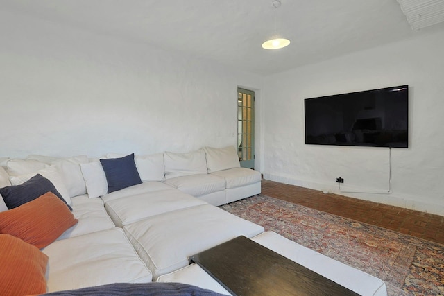 286 Lyncroft Rd, New Rochelle, NY 10804 - living area featuring baseboards and brick floors