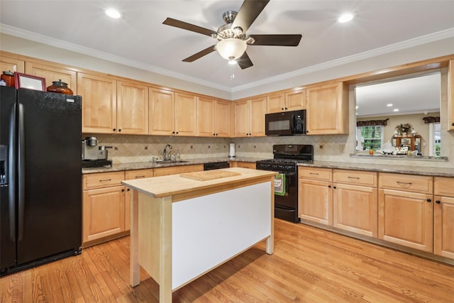 438 Genesee Ct, Suffern, NY 10901 - kitchen featuring black appliances, light brown cabinets, light wood-style flooring, ceiling fan, and decorative backsplash