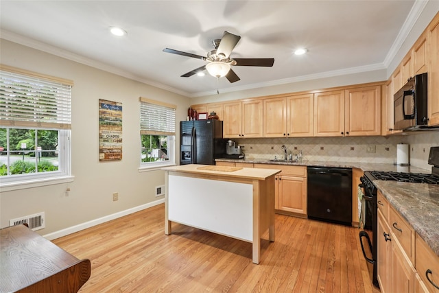 438 Genesee Ct, Suffern, NY 10901 - kitchen with black appliances, light brown cabinets, tasteful backsplash, ceiling fan, and ornamental molding