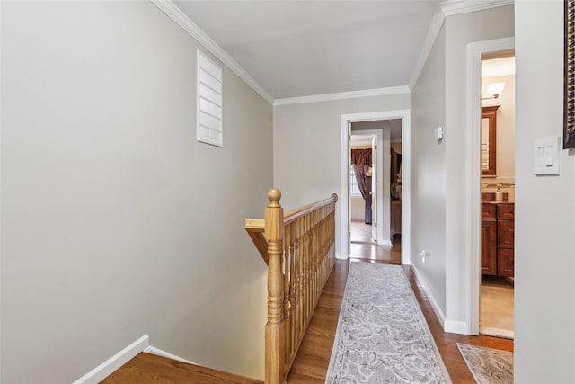 438 Genesee Ct, Suffern, NY 10901 - corridor with an upstairs landing, wood finished floors, and crown molding
