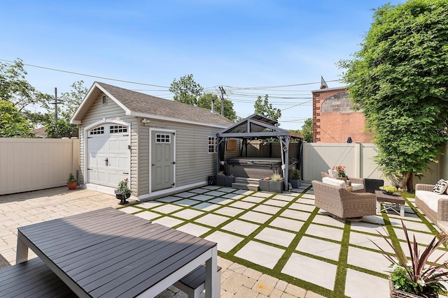 15707 22nd Ave, Whitestone, NY 11357 - fenced backyard featuring a hot tub, a patio, an outdoor structure, a detached garage, and a gazebo