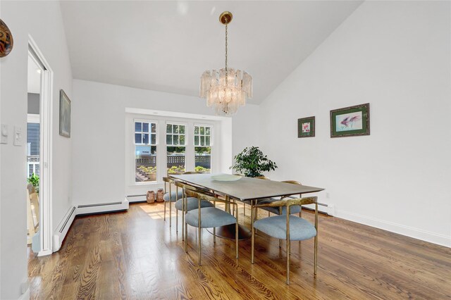 62 Woodhail St, Lido Beach, NY 11561 - dining space with a chandelier, lofted ceiling, wood finished floors, a baseboard radiator, and baseboards