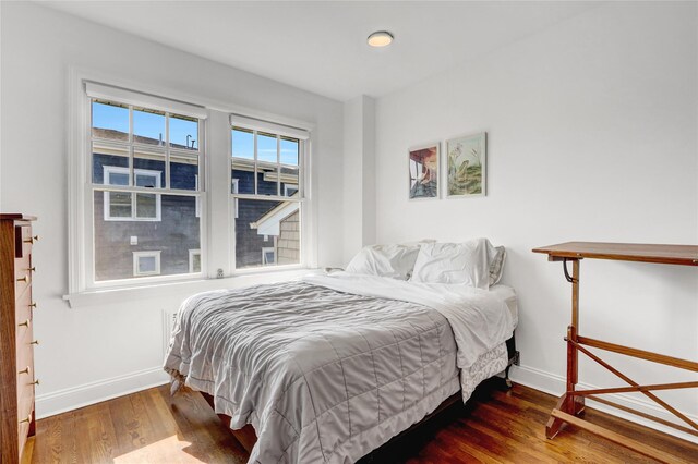 62 Woodhail St, Lido Beach, NY 11561 - bedroom with wood finished floors and baseboards