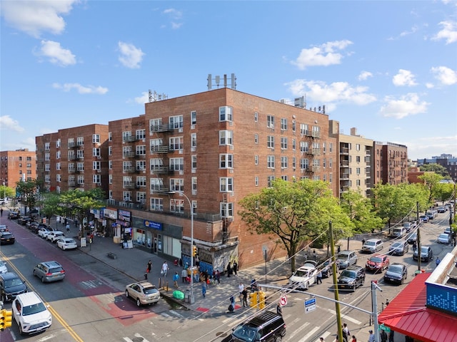134-54 Maple Ave Unit 3W, Flushing, NY 11355 - view of apartment building / complex featuring uncovered parking