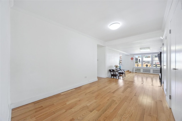 134-54 Maple Ave Unit 3W, Flushing, NY 11355 - unfurnished room with light wood-style floors, ornamental molding, and baseboards
