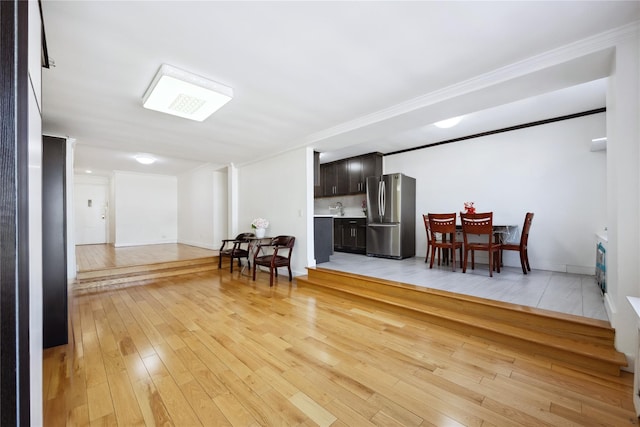 134-54 Maple Ave Unit 3W, Flushing, NY 11355 - sitting room featuring light wood-type flooring, crown molding, and baseboards