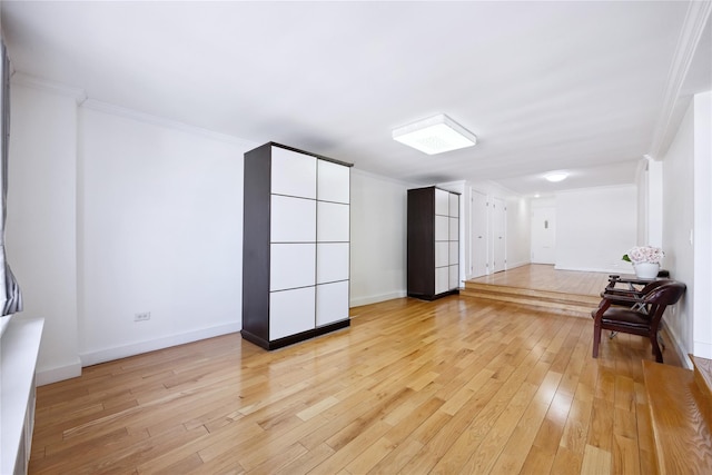 134-54 Maple Ave Unit 3W, Flushing, NY 11355 - unfurnished room with light wood-style flooring, ornamental molding, and baseboards