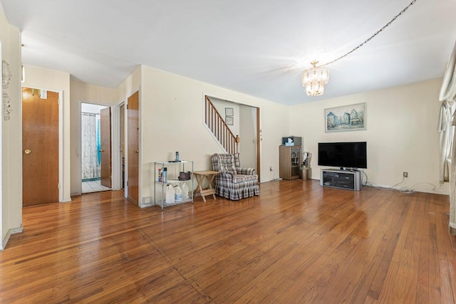 17 Linn Pl, Yonkers, NY 10705 - living room with hardwood / wood-style flooring, a chandelier, and stairway