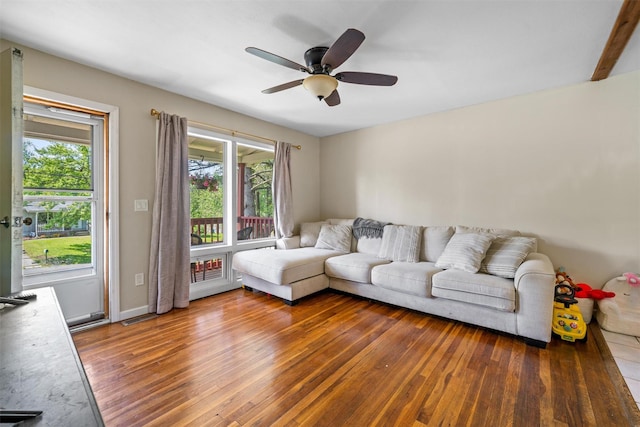 69 Wickham Dr, Warwick, NY 10990 - living area with wood-type flooring, ceiling fan, and baseboards