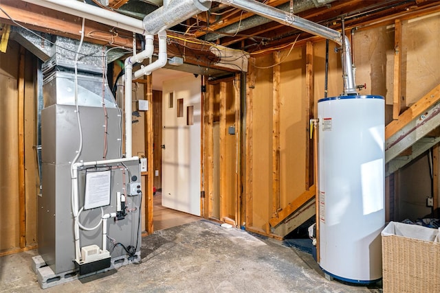69 Wickham Dr, Warwick, NY 10990 - unfinished basement featuring water heater and heating unit