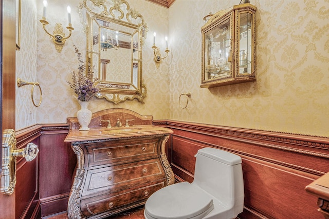 16136 90th St, Howard Beach, NY 11414 - bathroom with wallpapered walls, wainscoting, vanity, and toilet