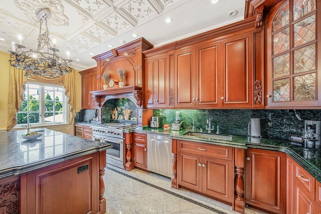 16136 90th St, Howard Beach, NY 11414 - kitchen with inlaid floor details, a sink, stainless steel appliances, a chandelier, and decorative backsplash