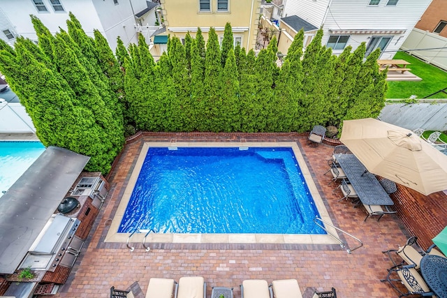 16136 90th St, Howard Beach, NY 11414 - view of pool featuring a patio area and a fenced backyard