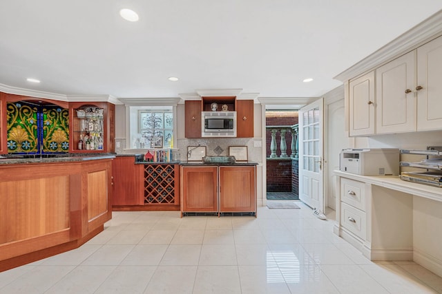 16136 90th St, Howard Beach, NY 11414 - kitchen featuring stainless steel microwave, backsplash, open shelves, recessed lighting, and light tile patterned floors