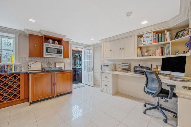16136 90th St, Howard Beach, NY 11414 - office with built in study area, recessed lighting, crown molding, and light tile patterned floors