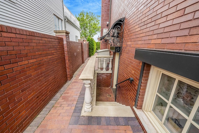 16136 90th St, Howard Beach, NY 11414 - view of home's exterior featuring brick siding