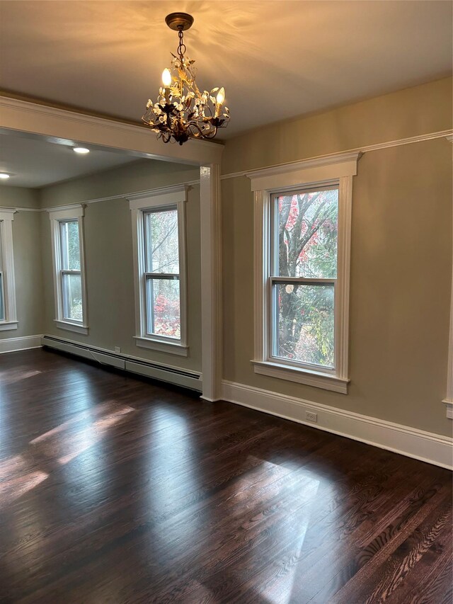11 Fox Holw, Hillburn, NY 10931 - empty room with baseboard heating, a chandelier, and dark wood-type flooring