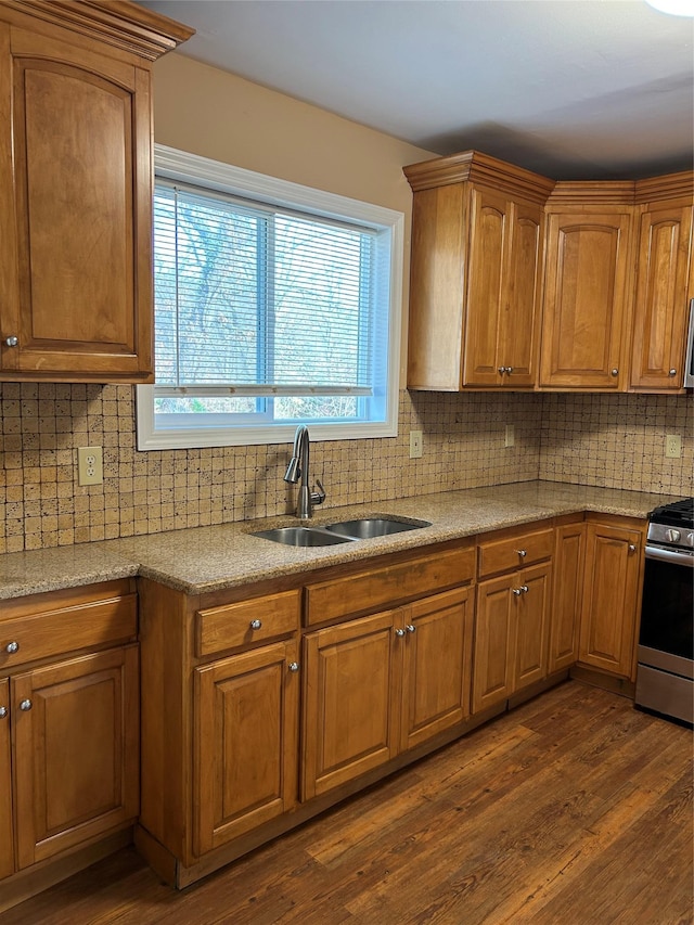 11 Fox Holw, Hillburn, NY 10931 - kitchen with stainless steel gas stove, tasteful backsplash, dark wood-style flooring, and brown cabinetry