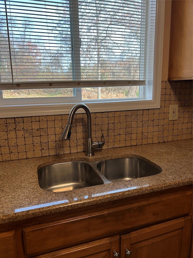 11 Fox Holw, Hillburn, NY 10931 - kitchen view of backsplash, light stone counters, and brown cabinetry