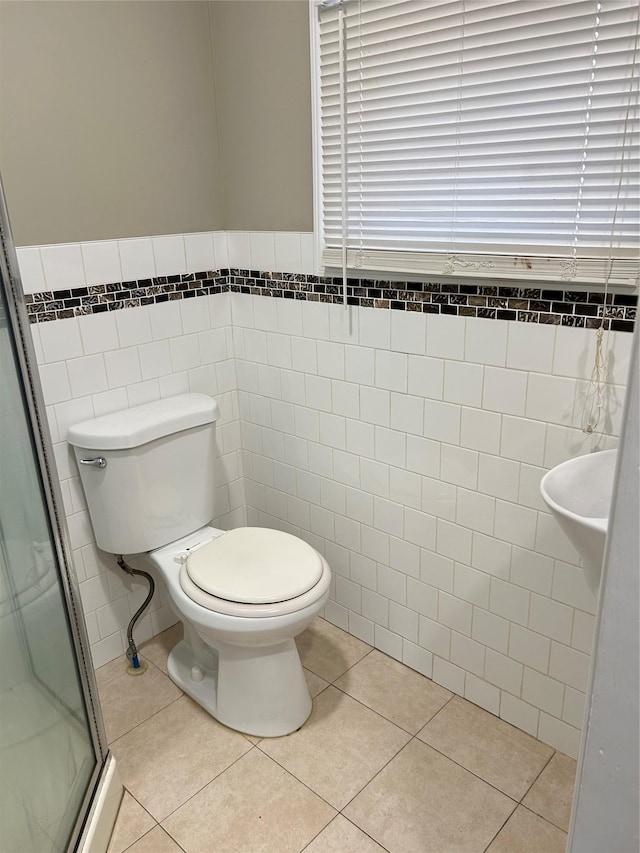 11 Fox Holw, Hillburn, NY 10931 - bathroom with tile walls, a stall shower, and tile patterned floors