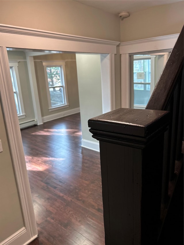 11 Fox Holw, Hillburn, NY 10931 - corridor featuring a baseboard radiator, plenty of natural light, and dark wood-style floors