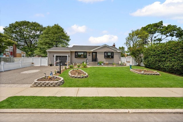 220 Farhan Ln, North Babylon, NY 11703 - ranch-style home with an attached garage, asphalt driveway, and a gate