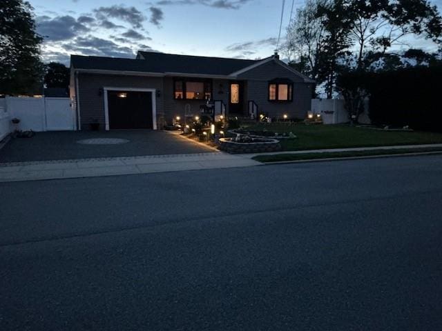 220 Farhan Ln, North Babylon, NY 11703 - ranch-style house featuring driveway and a garage