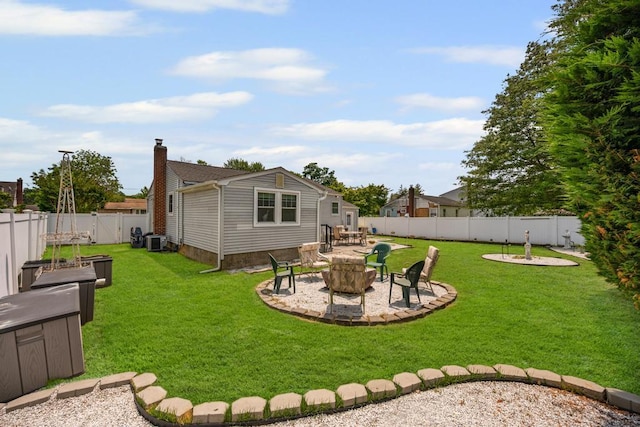 220 Farhan Ln, North Babylon, NY 11703 - fenced backyard with a patio and a fire pit