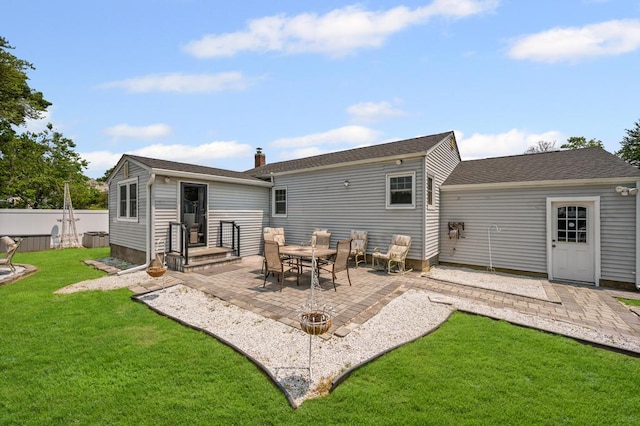 220 Farhan Ln, North Babylon, NY 11703 - back of house with a patio area