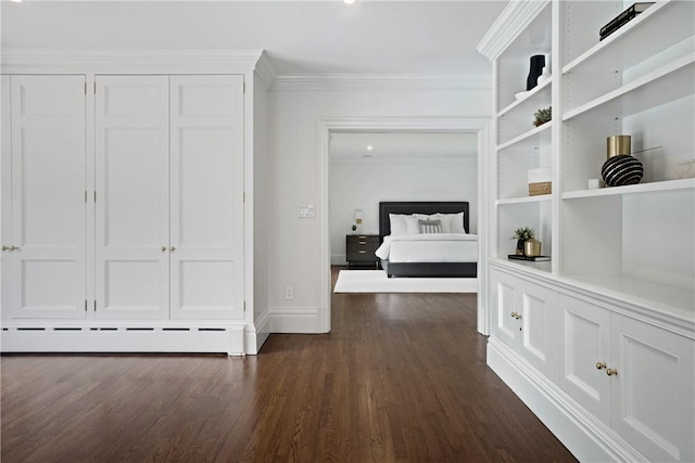 792-820 Old Post Rd, Bedford, NY 10506 - hall featuring a baseboard radiator, dark wood-type flooring, ornamental molding, baseboards, and built in features