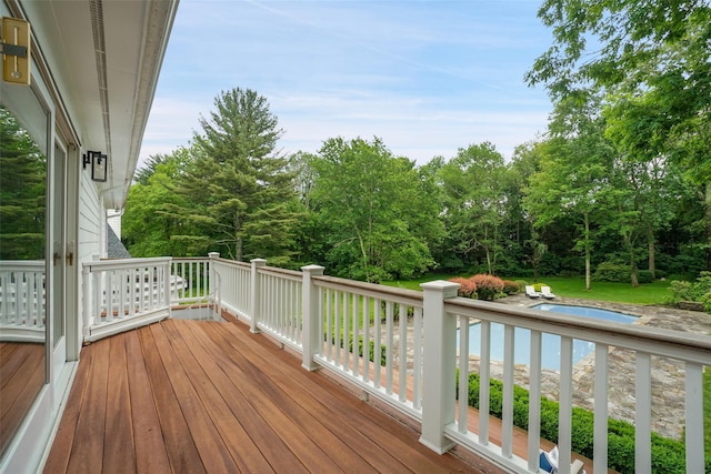 792-820 Old Post Rd, Bedford, NY 10506 - deck featuring an outdoor pool and view of scattered trees
