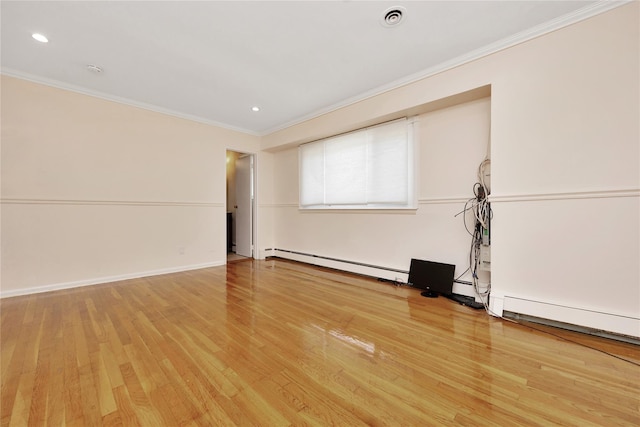 446 Joan Ct, West Hempstead, NY 11552 - empty room with ornamental molding, light wood finished floors, baseboard heating, and recessed lighting