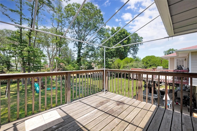 446 Joan Ct, West Hempstead, NY 11552 - wooden deck featuring a lawn and view of wooded area
