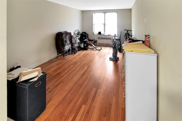 2105 Wallace Ave Unit 4A, Bronx, NY 10462 - exercise area with radiator heating unit and light wood-style floors