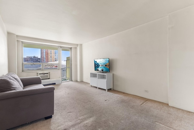 61-15 97th St Unit 8M, Rego Park, NY 11374 - carpeted living area with a wall unit AC