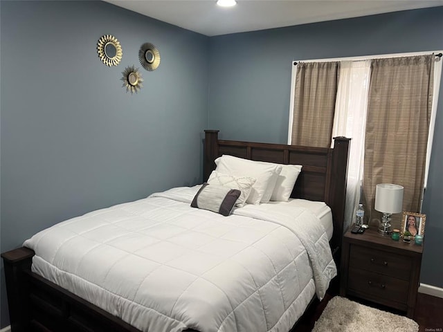 1251 Udall Rd, Bay Shore, NY 11706 - bedroom with wood finished floors, baseboards, and recessed lighting