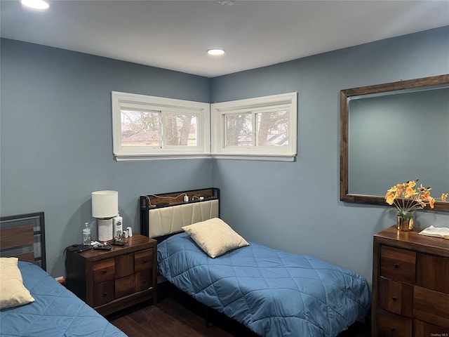 1251 Udall Rd, Bay Shore, NY 11706 - bedroom featuring multiple windows, dark wood-style flooring, and recessed lighting