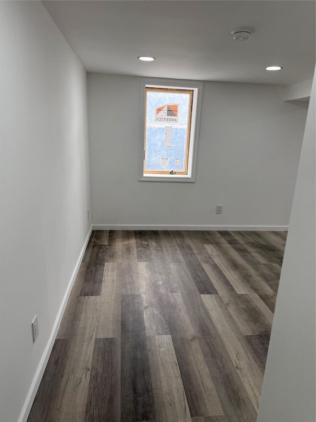 1251 Udall Rd, Bay Shore, NY 11706 - unfurnished room with dark wood finished floors, baseboards, a smoke detector, and recessed lighting