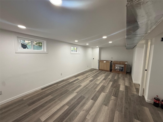 1251 Udall Rd, Bay Shore, NY 11706 - basement featuring dark wood finished floors, recessed lighting, and baseboards