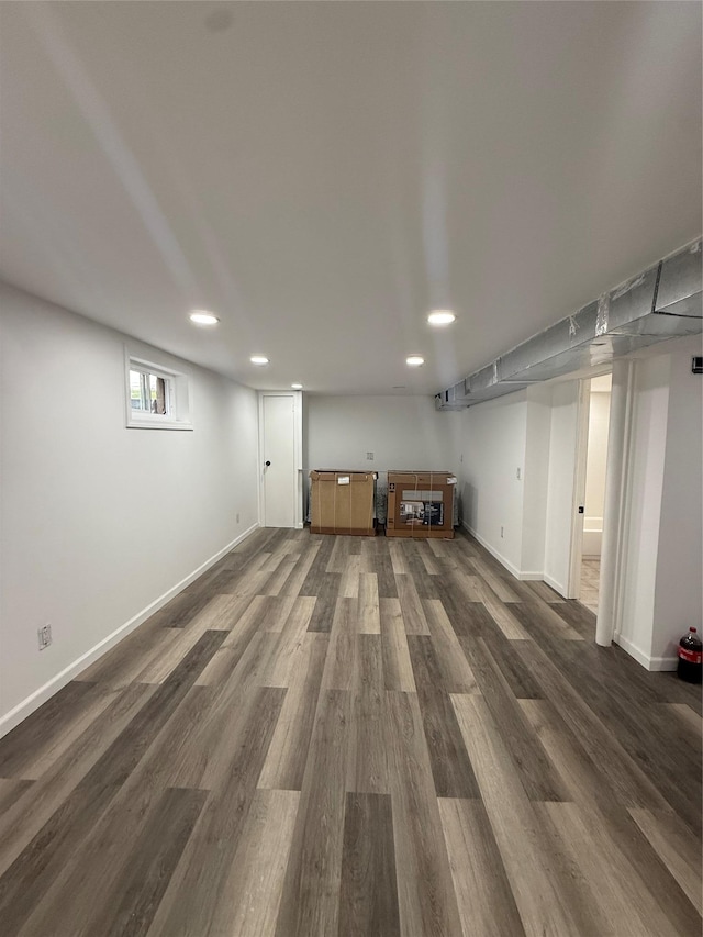 1251 Udall Rd, Bay Shore, NY 11706 - below grade area with recessed lighting, dark wood-style flooring, and baseboards