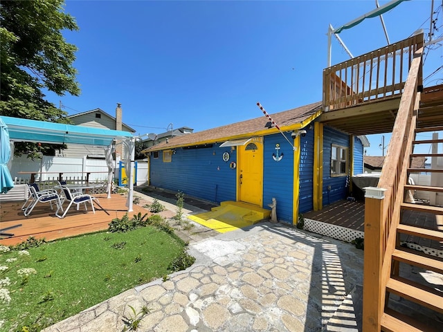 57 Pennyfield Cp, Bronx, NY 10465 - exterior space with a wooden deck and stairs