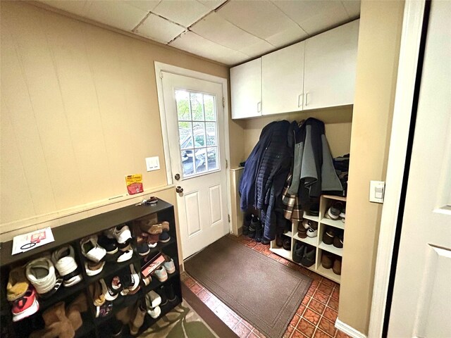 7 S Van Dyke Ave, Airmont, NY 10901 - mudroom with dark tile patterned flooring and a drop ceiling