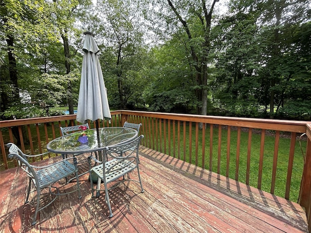 7 S Van Dyke Ave, Airmont, NY 10901 - wooden deck featuring outdoor dining area and a yard