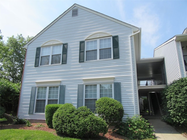 1 Brook Dr Unit 13, Washingtonville, NY 10992 - view of front facade featuring a balcony