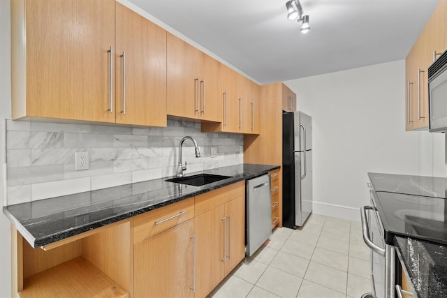 341 Furnace Dock Rd Unit 30, Cortlandt Manor, NY 10567 - kitchen with appliances with stainless steel finishes, backsplash, dark stone counters, and light tile patterned floors