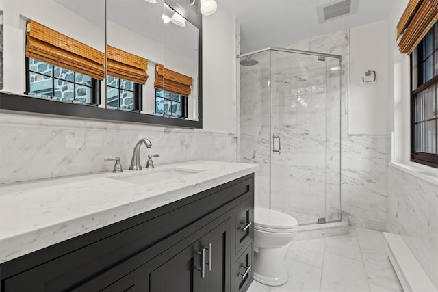 341 Furnace Dock Rd Unit 30, Cortlandt Manor, NY 10567 - full bathroom featuring tile walls, marble look tile flooring, vanity, a marble finish shower, and wainscoting
