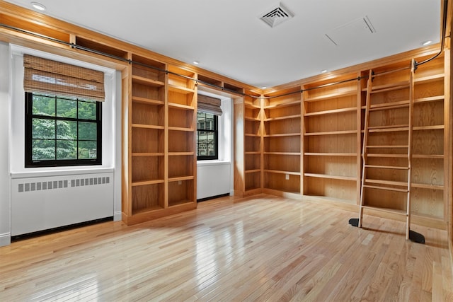 341 Furnace Dock Rd Unit 30, Cortlandt Manor, NY 10567 - unfurnished room featuring radiator heating unit, built in features, and wood finished floors