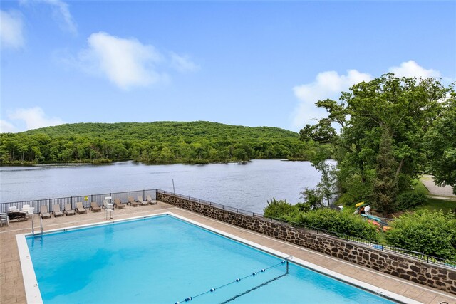 341 Furnace Dock Rd Unit 30, Cortlandt Manor, NY 10567 - community pool with a forest view and a water view