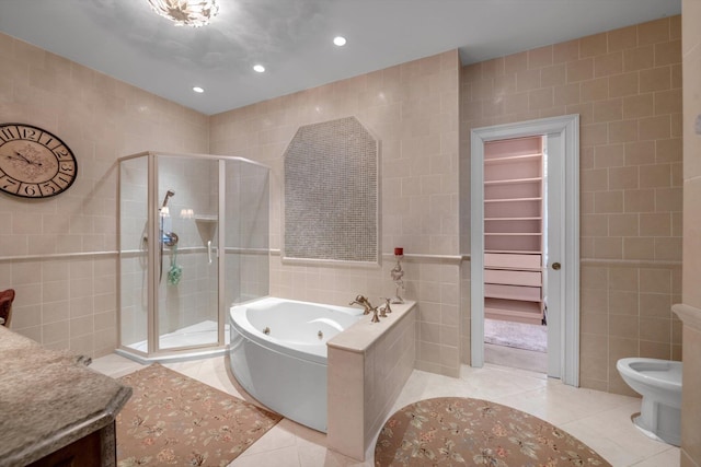 251 Wilmot Dr, Hewlett, NY 11557 - bathroom with tile walls, tile patterned flooring, a stall shower, a tub with jets, and recessed lighting
